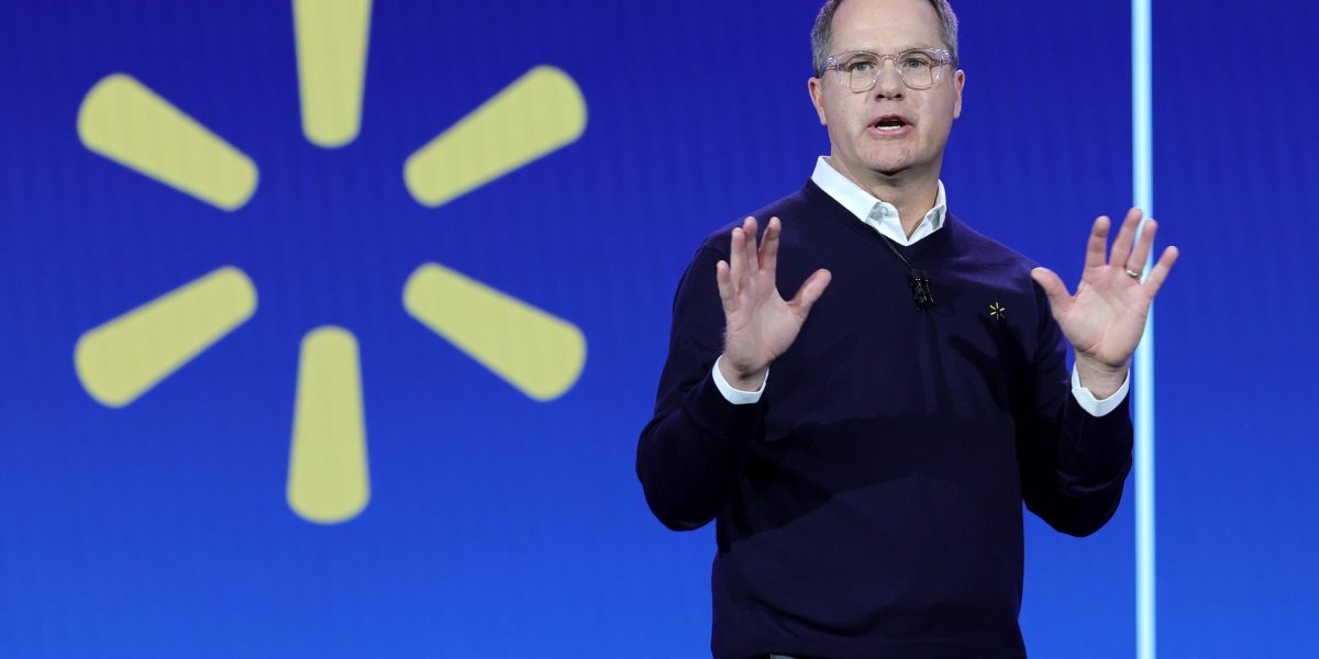 Walmart CEO wants 'everybody to make it to the other side' and the retail giant will keep headcount flat for now even as AI changes every job