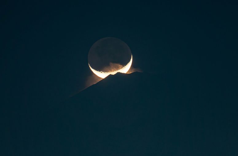 Crescent moon in the sky.