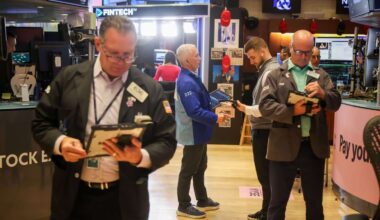 Dow Slips as Nasdaq Closes at Fresh Record; Tesla Leads Tech Stocks Higher