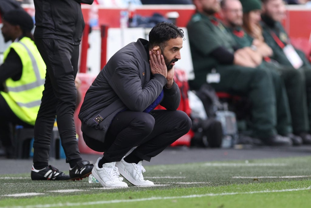 Ruben Amorim puts his head in his hand during Manchester United's defeat against Brentford