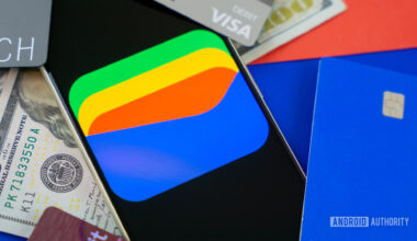 Google Wallet logo on smartphone next to credit cards and cash Stock photo 8