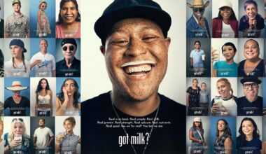 A collage of diverse people smiling with milk mustaches. The central figure wears a cap and black shirt, also with a milk mustache. Text at the bottom reads, "got milk?" and highlights the benefits of milk.