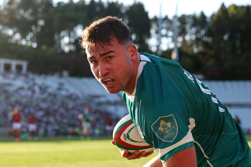 Shayne Bolton celebrates scoring Ireland's seventh try against Portugal in July. Photograph: Ben Brady/INPHO