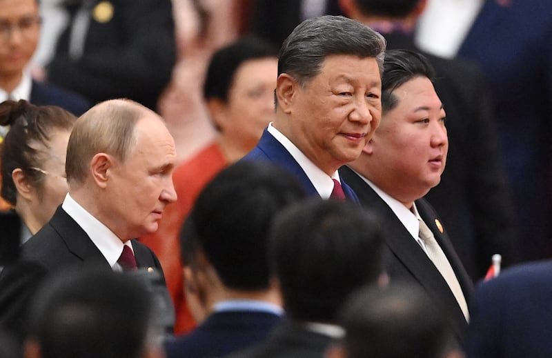 China's president Xi Jinping, North Korea's leader Kim Jong-un and Russia's president Vladimir Putin arrive for a reception in the Great Hall of the People, following the military parade. Photoraph: Jade Gao / AFP