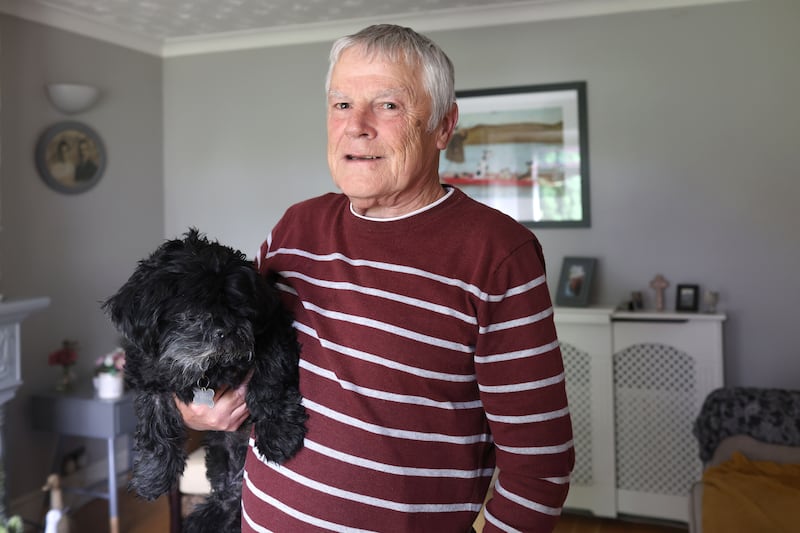 David Adams with his dog, Walter, at his home in Co Armagh. Photograph: Stephen Davison