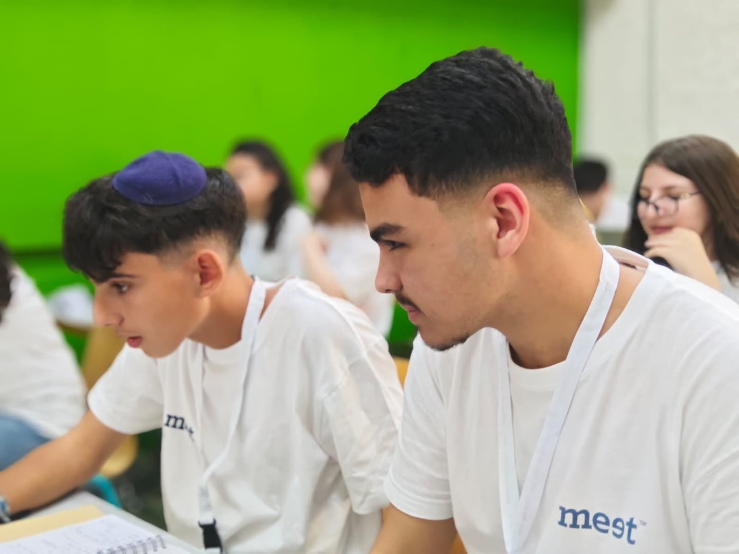 Israeli and Palestinian participants in the MEET program work together on technological and entrepreneurial projects.