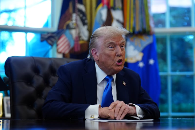 US president Donald Trump speaks to reporters in the Oval Office on Friday. Photograph: Tierney L Cross/The New York Times
                      