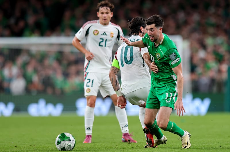 Finn Azaz in action against Hungary's Dominik Szoboszlai. Photograph: Ryan Byrne/Inpho