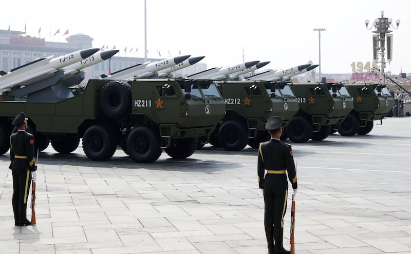 Armoured vehicles carrying the YJ-15 supersonic anti-ship cruise missile. Photograph: EPA