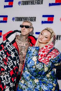 Travis Barker and Alabama Luella Barker arrive at the Tommy Hilfiger Fall 2022 ready to wear runway front row at the Skyline Drive-In in Brooklyn, New York on September 11, 2022.