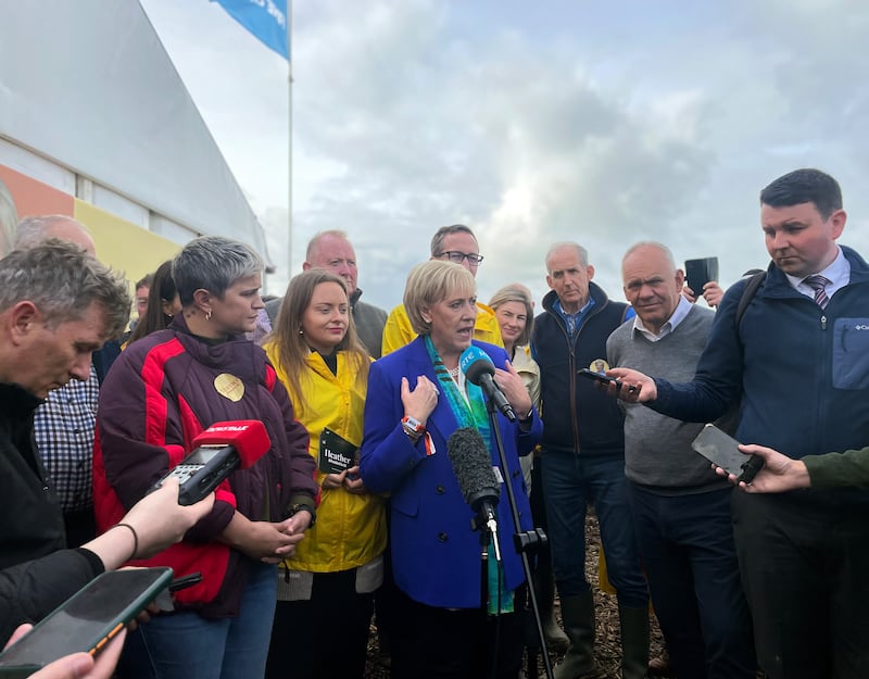 Presidential candidate Heather Humphreys (centre) speaks to media at the National Ploughing Championship at Tullamore, Co Offaly. Photograph: Grainne Ni Aodha




