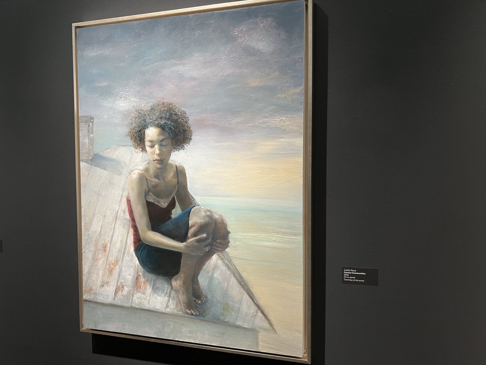 artwork hangs in a gallery