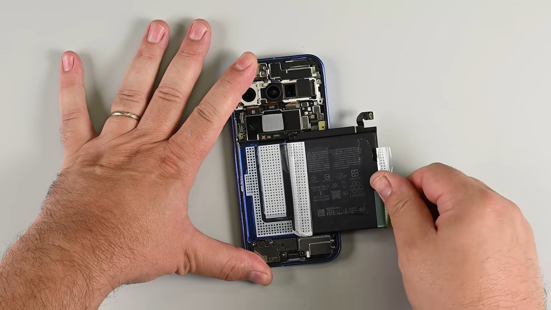 Pixel 10 iFixit Teardown Battery removal with plastic pull tab (4)