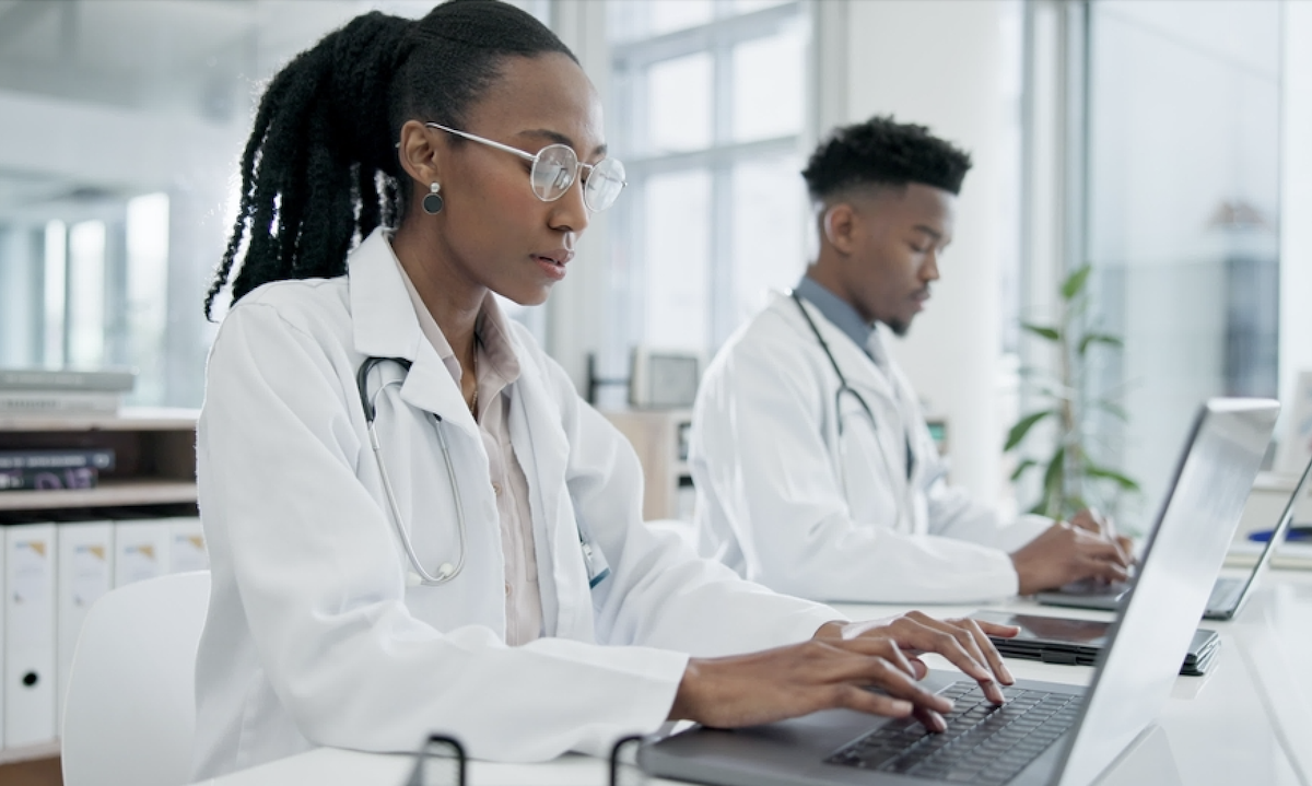 doctors on laptops