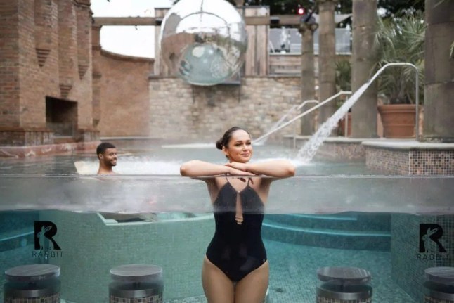 A woman in the Roman bath at the outdoor spa in The Rabbit