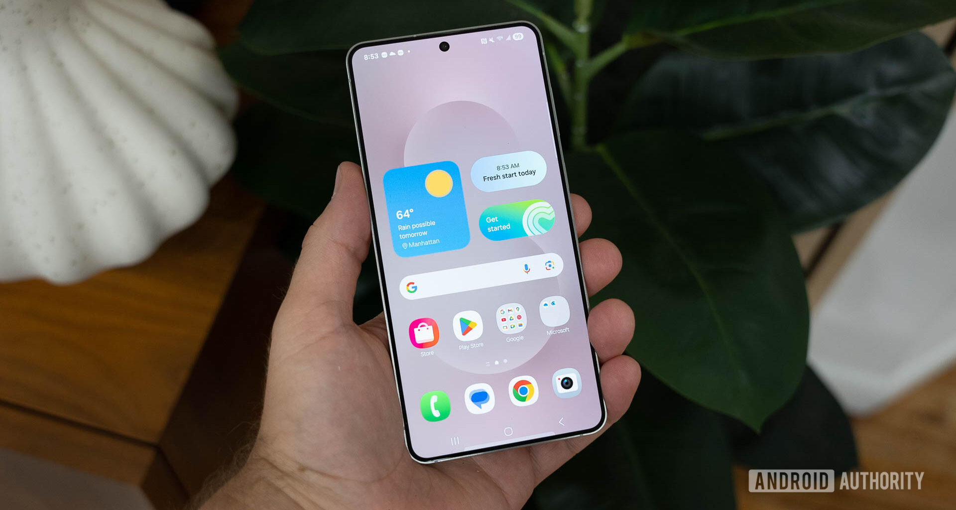 Samsung Galaxy S25 Edge Home Screen In Hand Showing One UI 7