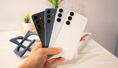 Samsung Galaxy S25 FE in all four colors fanned out in man's hand