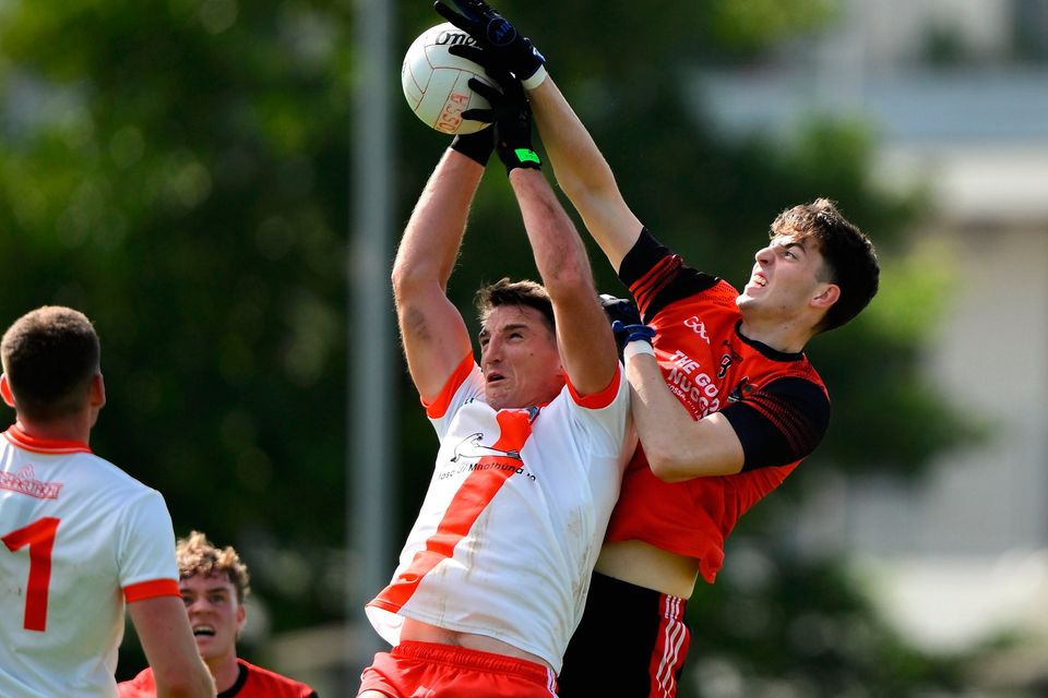 Former Cork footballer Aodán Breathnach of An Ghaeltacht and Fossa's Darren Ryan contest a kick-out during Sunday's Kerry IFC final. Photo: Brendan Moran/Sportsfile
