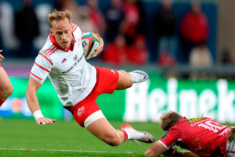 Mike Haley of Munster is tackled during the United Rugby Championship match between Scarlets and Munster at Parc Y Scarlets in Llanelli, Wales. Photo by Gareth Everett/Sportsfile
