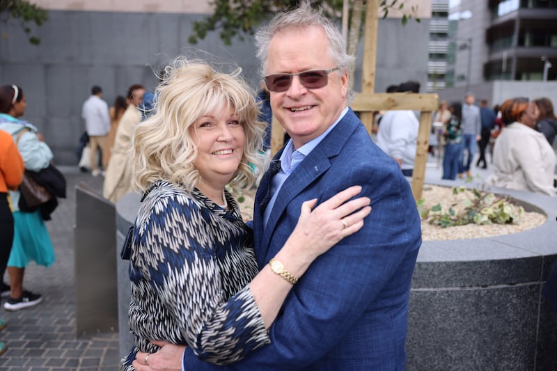 Miria Gilchrist celebrates with her husband, Jonathan, following the ceremony.  Photograph: Dara Mac Dónaill