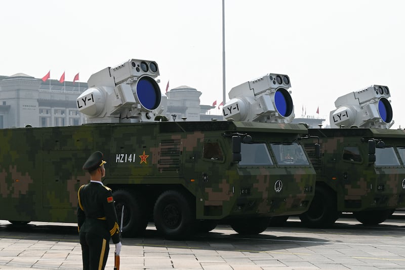 Laser weapons seen during military parade in Beijing's Tiananmen Square. Photograph:  Greg Baker/AFP via Getty Images      