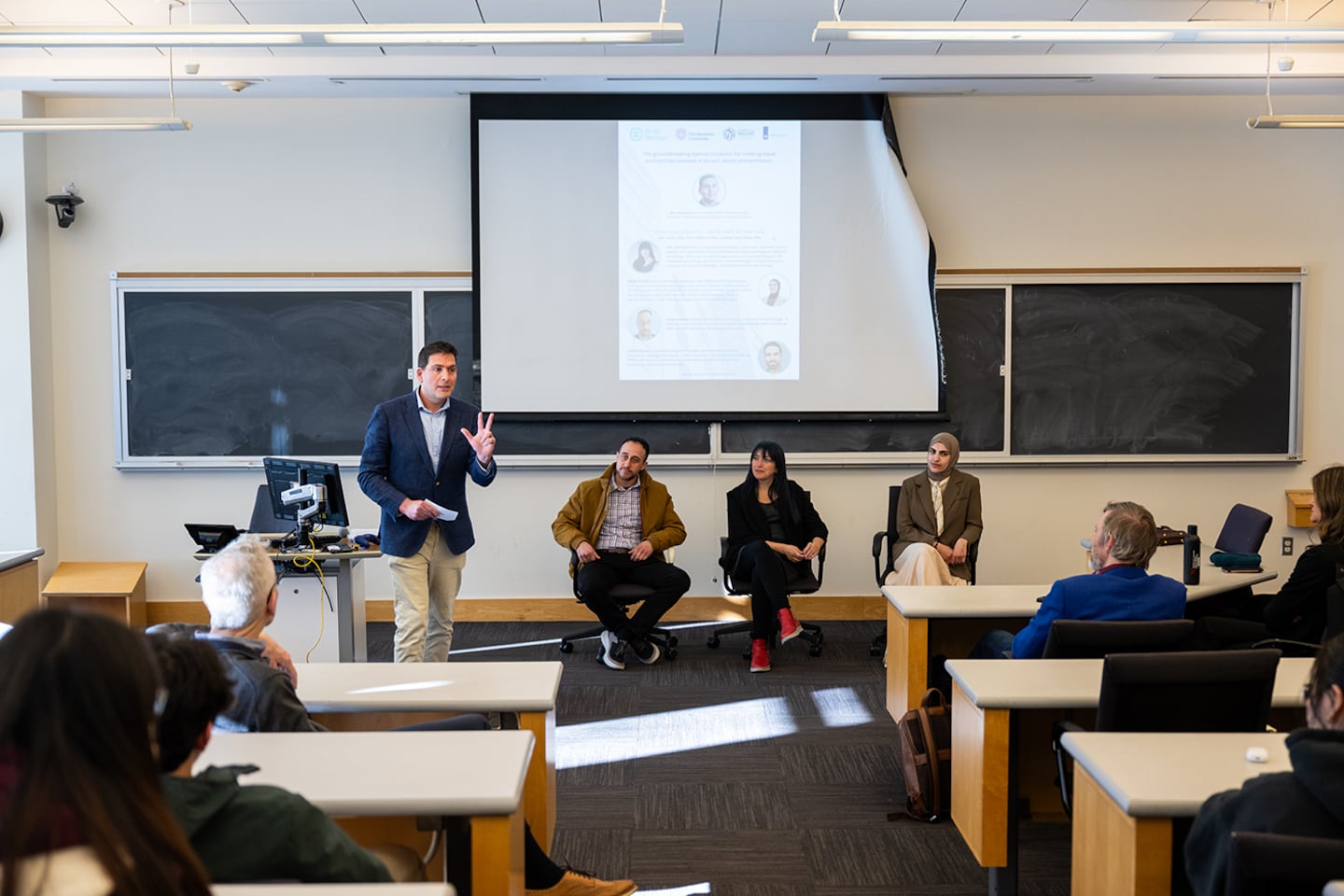 Northeastern Professor and 50:50 co-founder Amir Grinstein brought three participants of the program to Boston to speak with members of the Northeastern community.