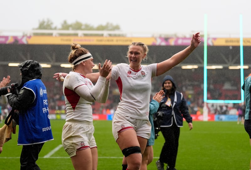 England's Megan Jones and Rosie Galligan celebrate after their quarter-final win over Scotland. Photograph: Andrew Matthews/PA