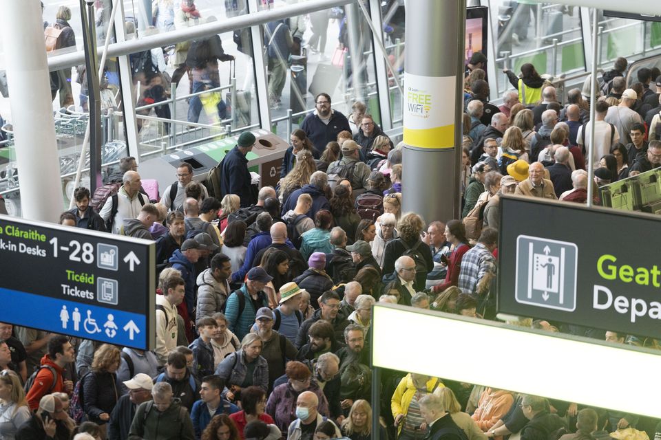 Passengers being cleared from Terminal 2 at Dublin Airport on Saturday morning. Photo: Sam Boal/Collins