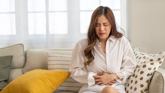 DGBI symptoms include abdominal pain, bloating, acid reflux.(Shutterstock)