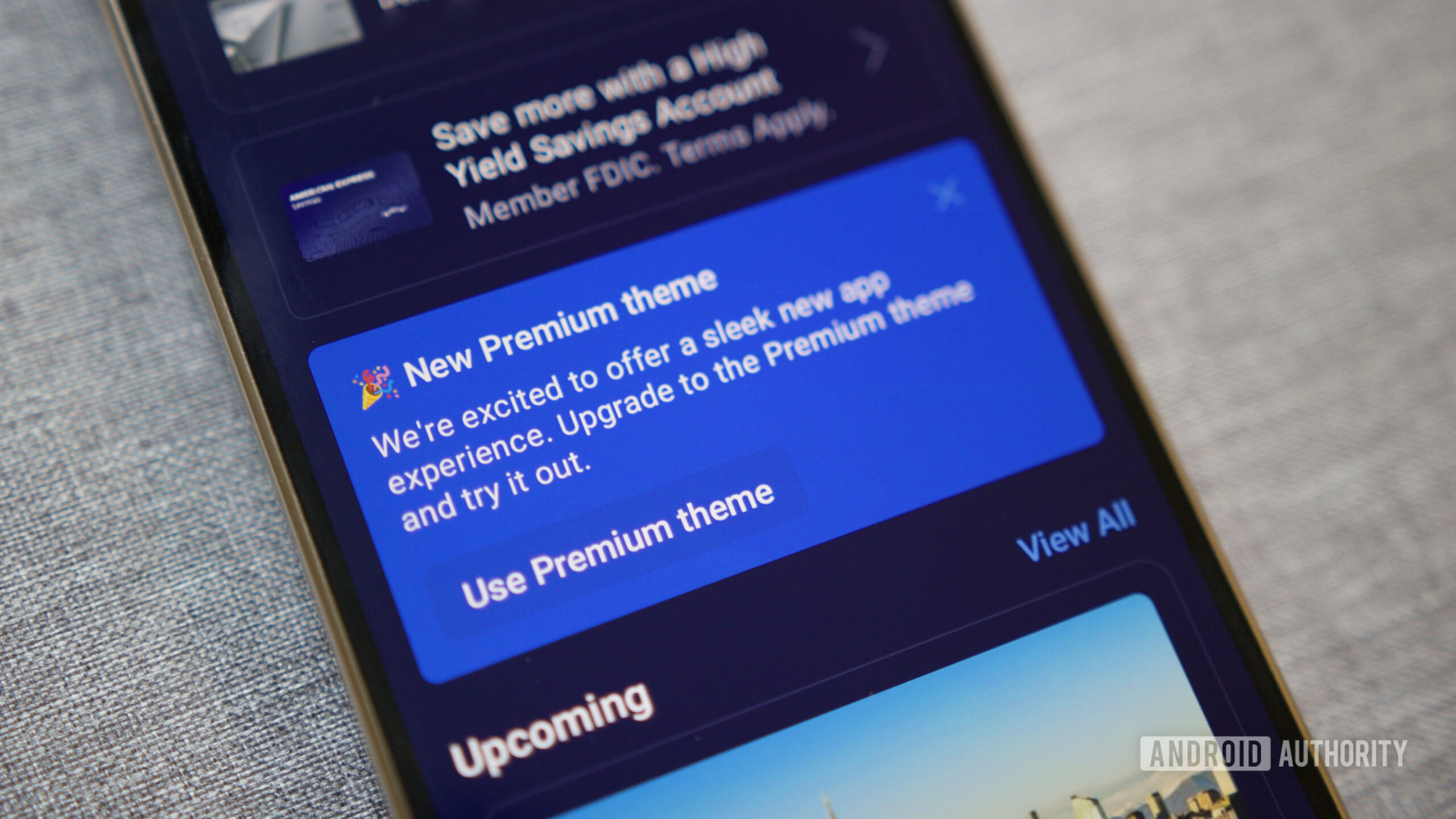 A banner in the American Express app advertising the new Premium Theme.