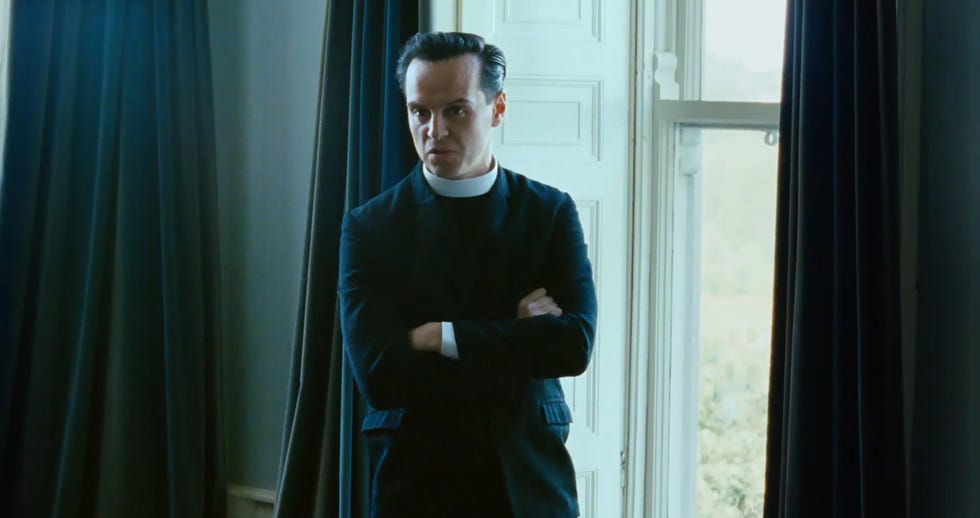 Andrew Scott, Jimmy's Hall trailer andrew scott standing with arms crossed near a window in a dimly lit room in trailer for jimmy's hall