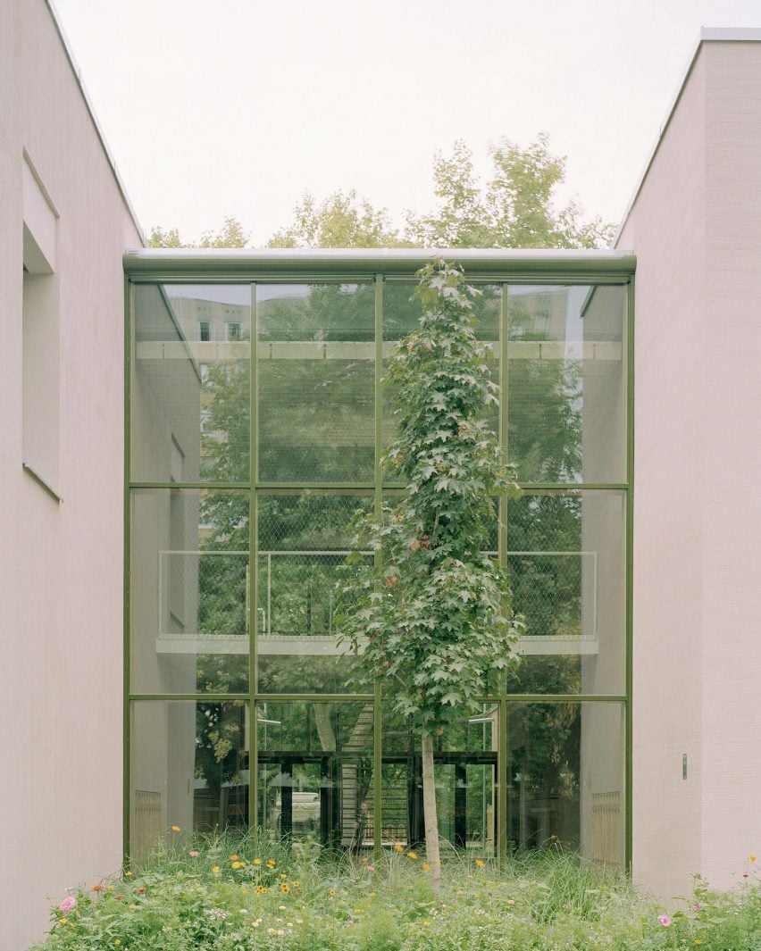 Full-height window of Gyöngyszem Kindergarten by Archikon