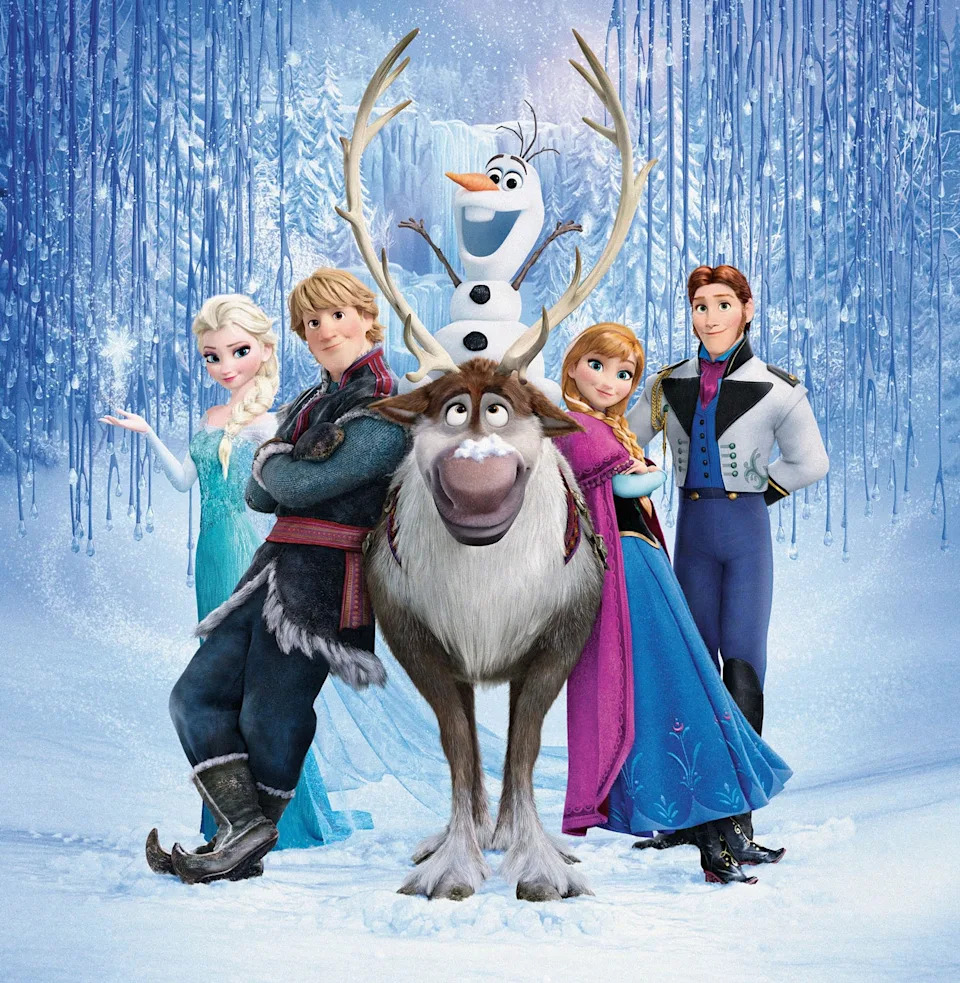 Characters from "Frozen" stand together in a snowy landscape: Elsa, Kristoff, Olaf, Sven, and Anna with winter attire, exuding a magical aura