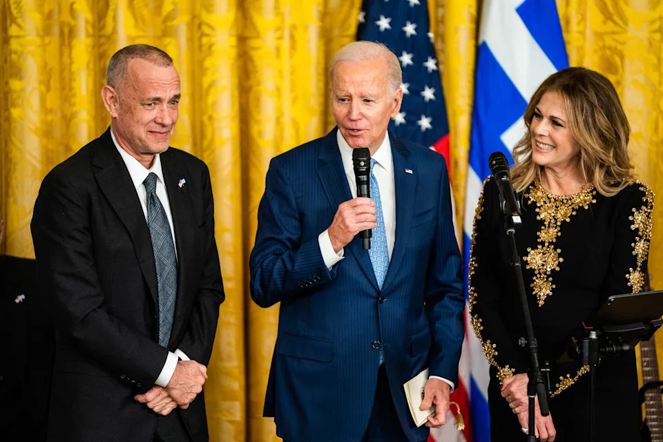 President Joe Biden, with actor Tom Hanks and his wife, the actress and musician Rita Wilson, at the White House in 2023. - (Demetrius Freeman/The Washington Post)