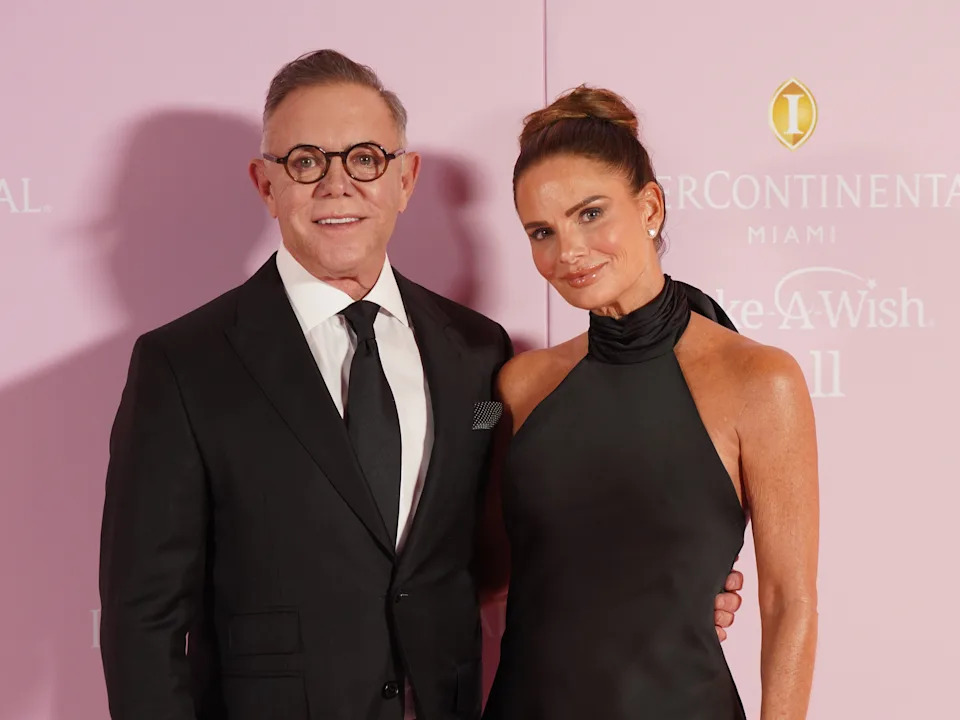 Shareef Malnik and Gabrielle Anwar posing together at a ball.