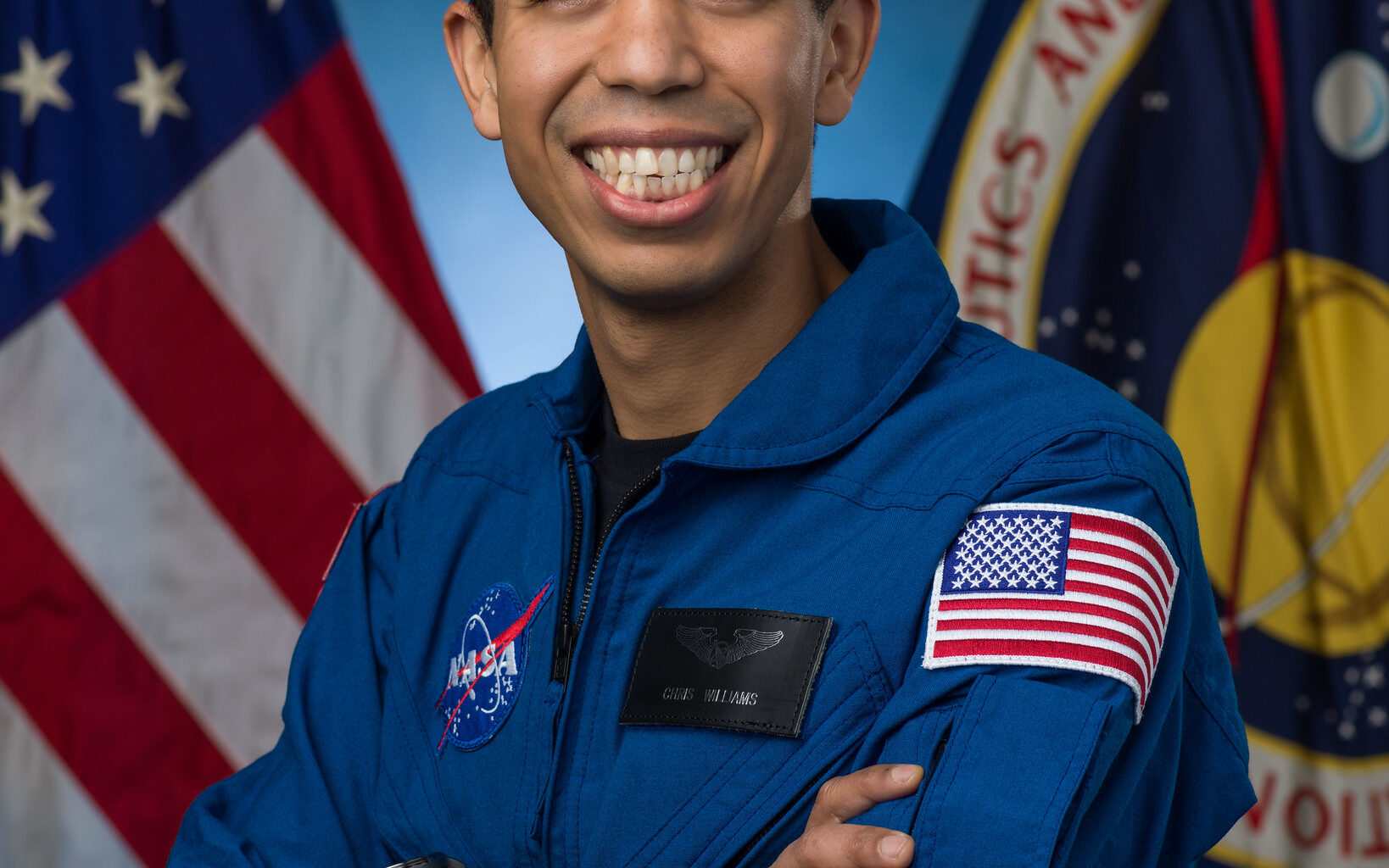 NASA astronaut Chris Williams poses for an official portrait at the agency’s Johnson Space Center in Houston.