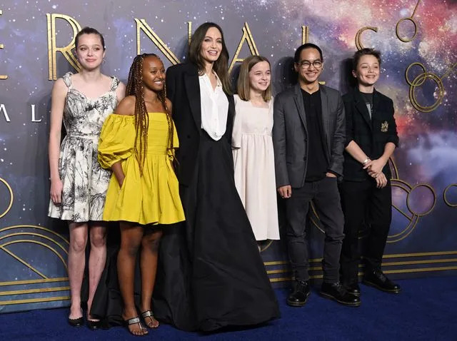 Getty Images Angelina Jolie with her kids Shiloh, Zahara, Vivienne, Maddox, and Knox in 2021.