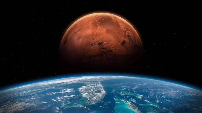 Earth and Mars in space