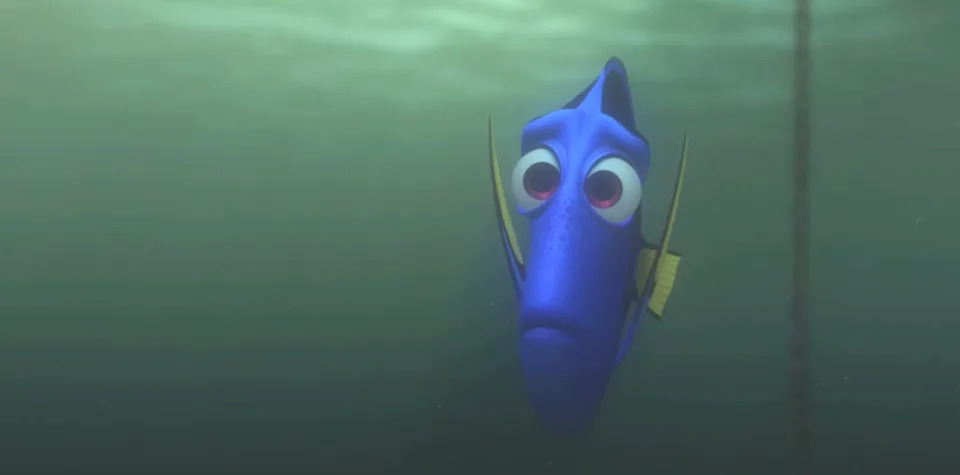 Animated blue fish with wide eyes in the ocean, from a popular movie