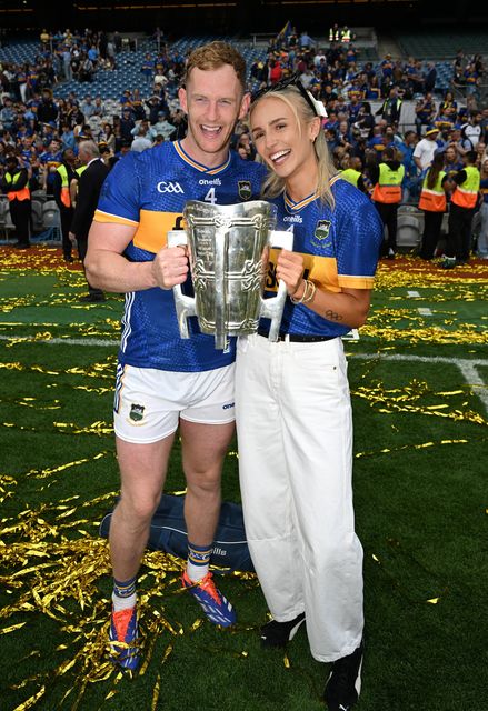 Tipperary's Michael Breen and partner Sharlene Mawdsley celebrate with the Liam MacCarthy cup after the Premier County's victory in the All-Ireland hurling final. Photo: Stephen McCarthy/Sportsfile