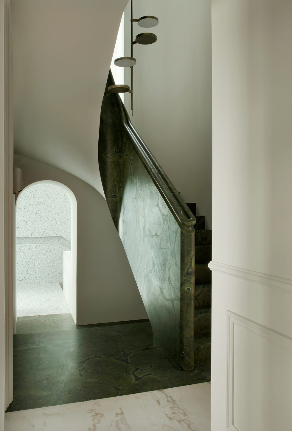 an irish house has a green stone staircase. an irish house has a green stone staircase.