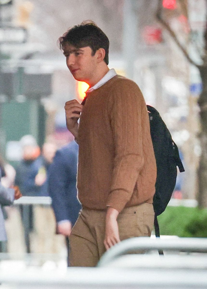Barron Trump embraces classic college style in a knit sweater at NYU