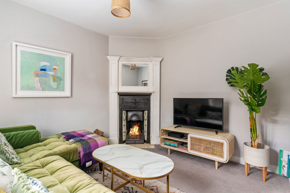 The sitting room, with open fire