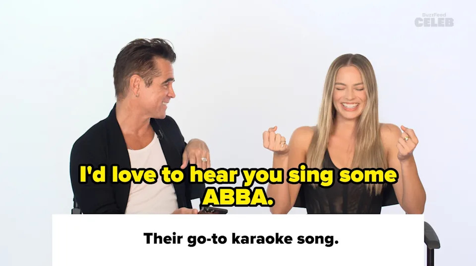Two individuals seated, smiling enthusiastically. The caption reads: "Their go-to karaoke song."