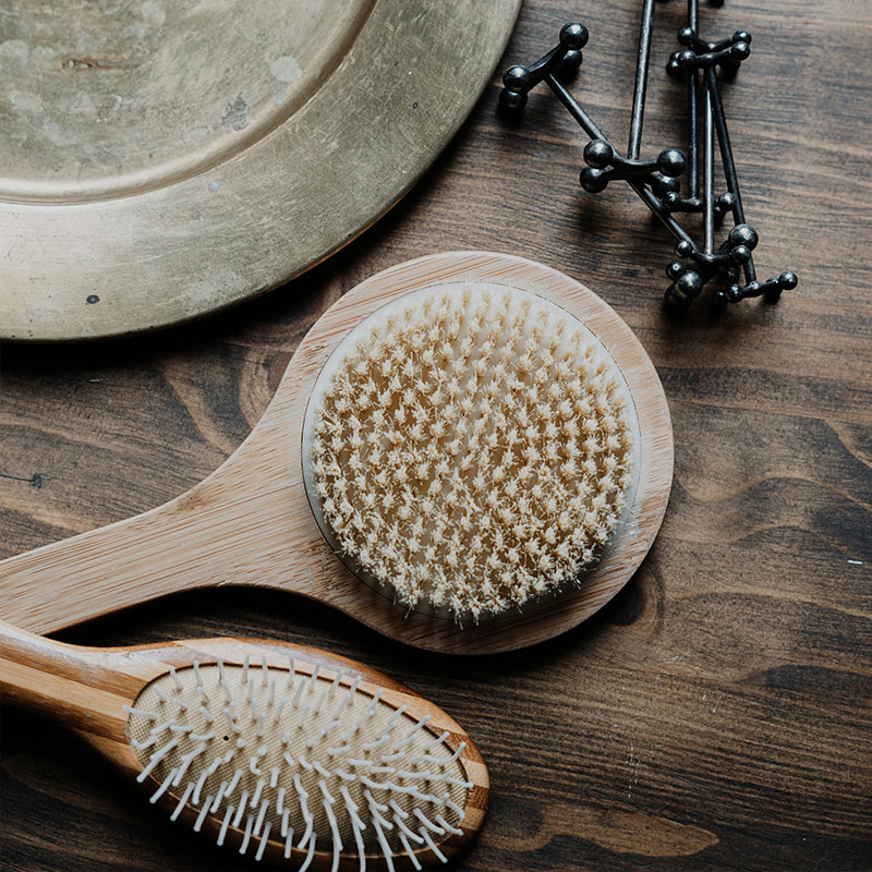 Brown Round Ceramic Plate With Brown Wooden Spoon