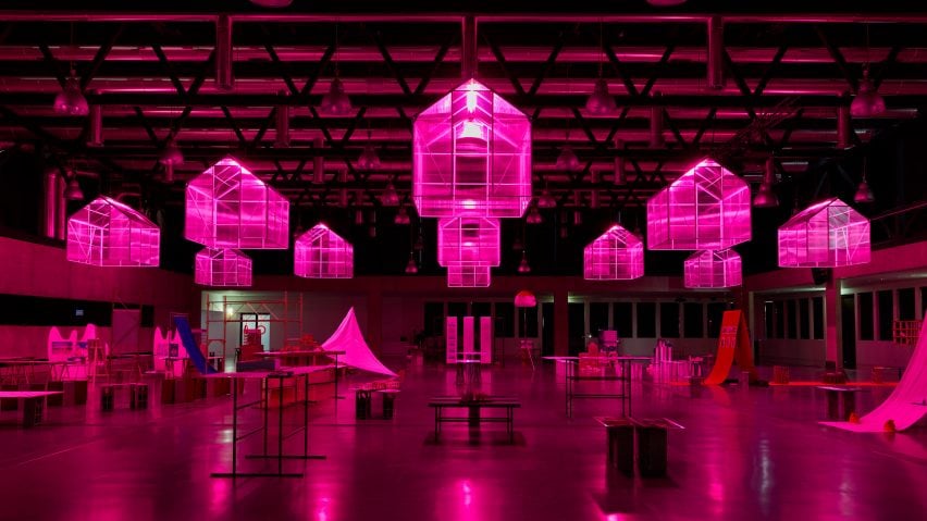 A photograph of an installation in tones of pink