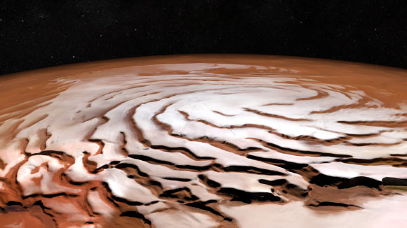 Perspective view of Mars’ north polar ice cap and its distinctive dark troughs forming a spiral-like pattern. The view is based on images taken by ESA’s Mars Express and generated using elevation data from the Mars Orbiter Laser Altimeter on board NASA’s Mars Global Surveyor. Image credit: ESA / DLR / FU Berlin / NASA / MGS / MOLA Science Team.
