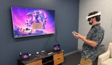 A man wearing a VR headset and holding controllers stands in front of a TV screen with the game&apos;s logo.