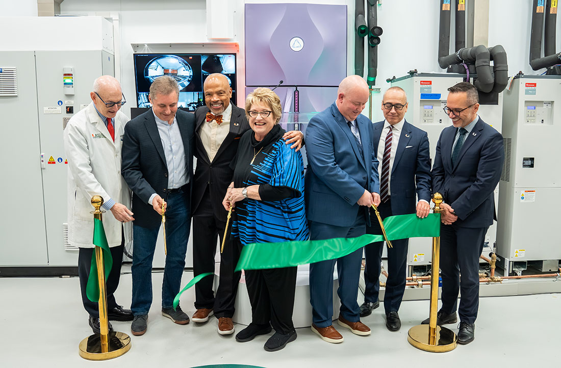 Dr. Margaret Pericak-Vance cuts the ribbon at the opening of the Hussman Institute biorepository.
