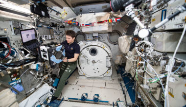 NASA astronaut Anne McClain performs the first series of tests of an Astrobee robot, Bumble, during a hardware checkout.